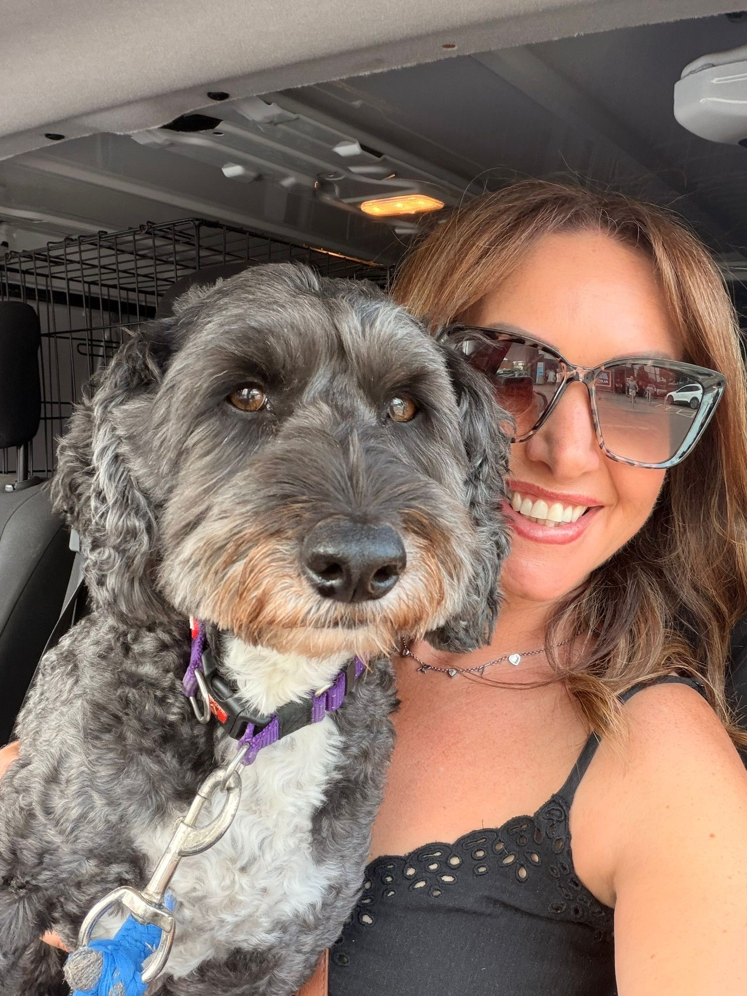 Stacy with a dog at Liberty's Pet Services